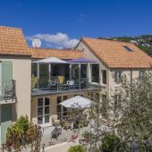 Sun drenched Western guests' terrace on Le Petit Hotel. Sun drenched Western guests' terrace on Le Petit Hotel.