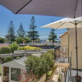 Sumner beach and esplanade viewed from Le Petit Hotel Sumner beach and esplanade viewed from Le Petit Hotel